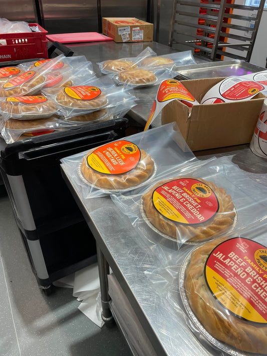 The 'Ansum Pasty Co. hand crimped family pies being packed in the bakery
